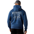 Person wearing a blue hoodie with 'Workhogs' branding on the back, standing against a white background.