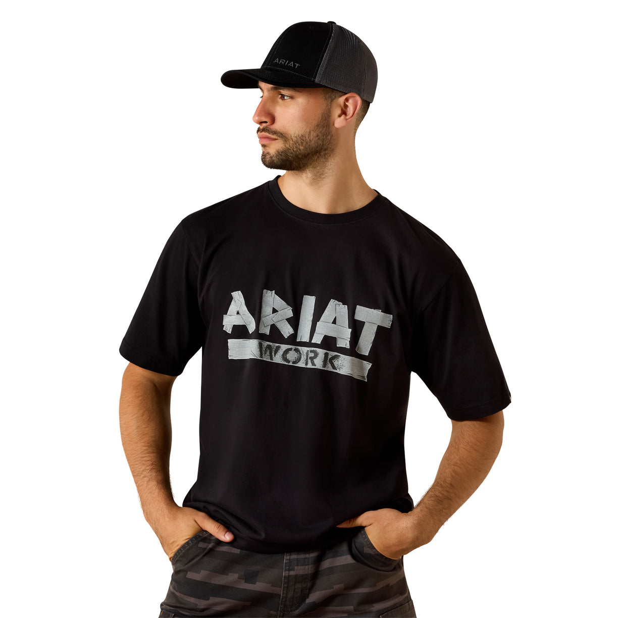 Man wearing a black Ariat Work Duct Logo tee with a distressed duct tape style graphic