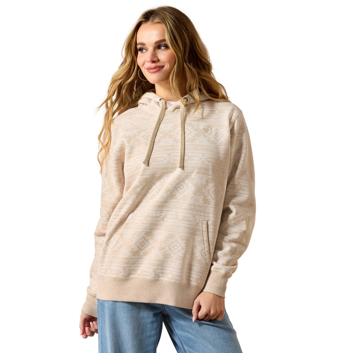 Woman wearing a beige hoodie on a white background