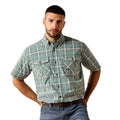 Man wearing a plaid short sleeve work shirt with dual chest pockets