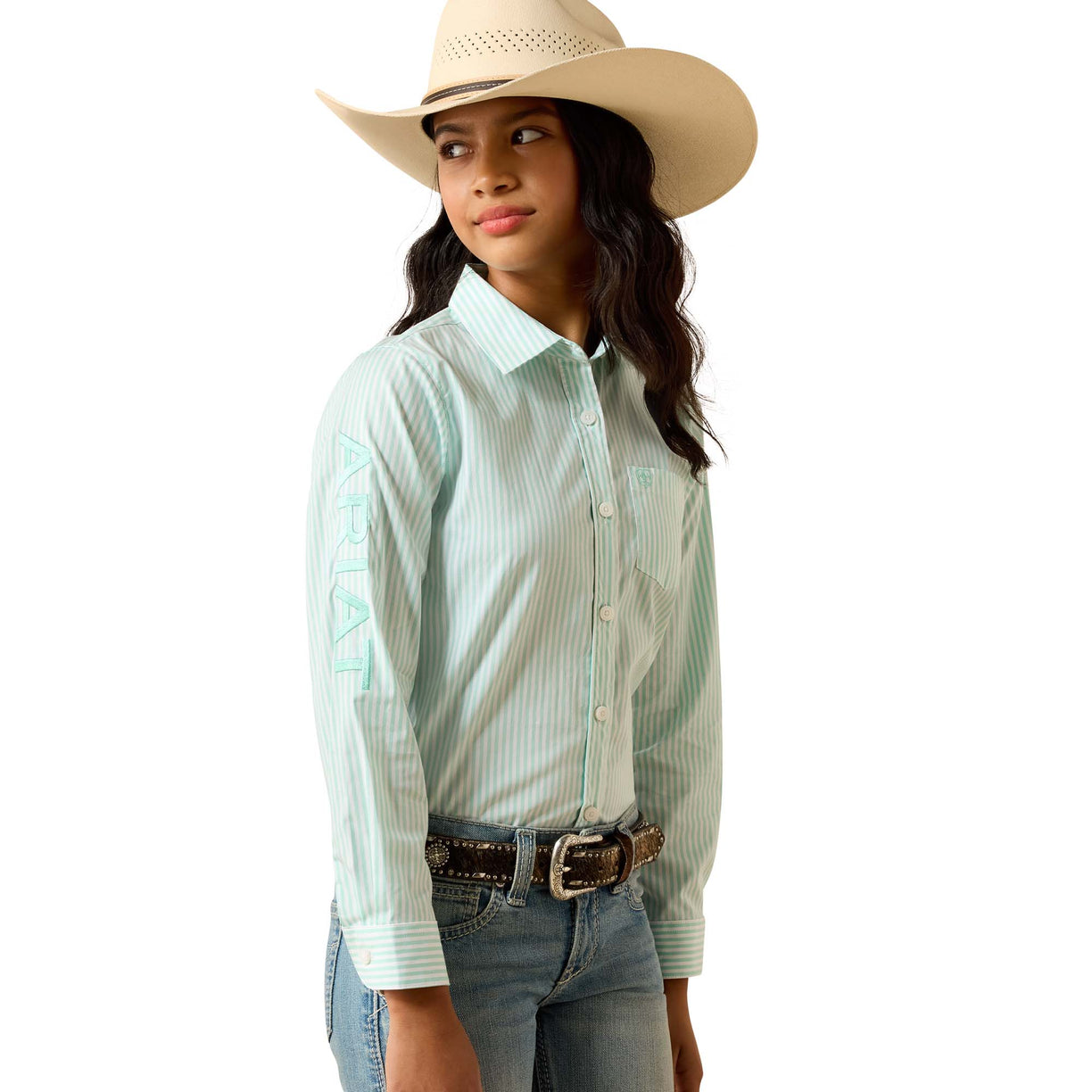 Woman wearing a light blue striped shirt, jeans, and a beige cowboy hat on a white background
