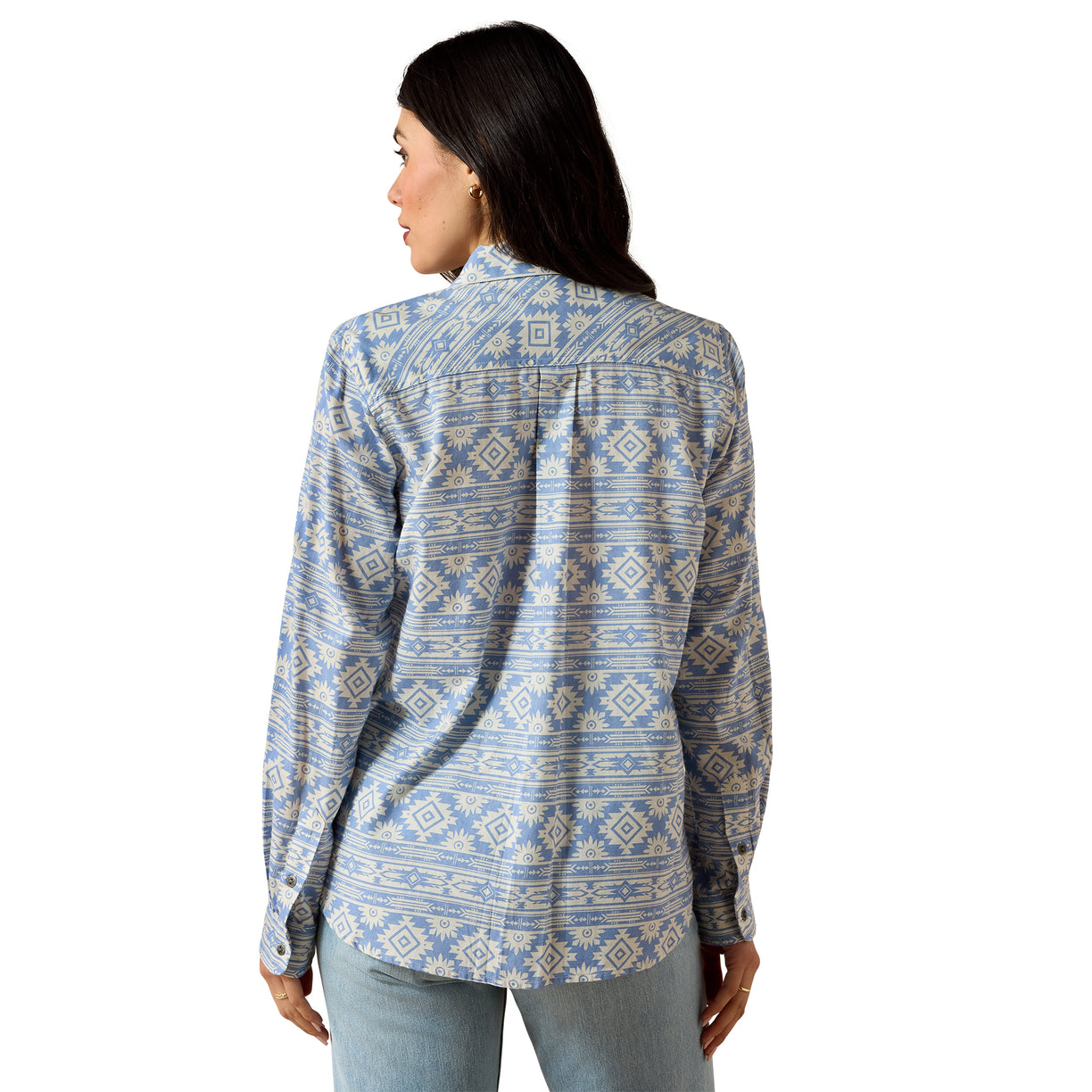 Woman wearing a blue patterned shirt on a white background