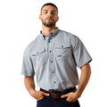 Man wearing a light grey short sleeve work shirt with dual chest pockets