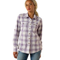 Woman wearing a lavender plaid long sleeve work shirt