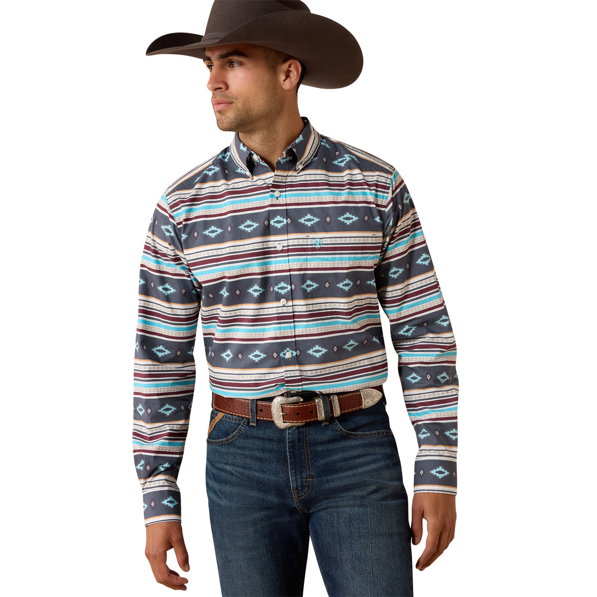 Ariat Pluto Fitted Shirt in a southwestern stripe print, styled with a leather belt and dark denim.