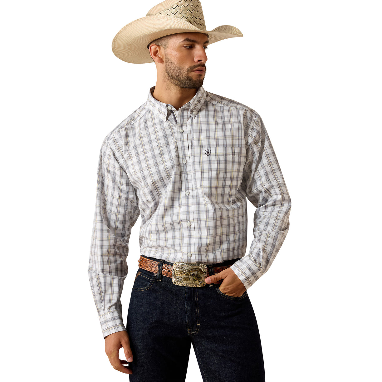 Plaid button-down shirt with a chest pocket, tucked into navy jeans.