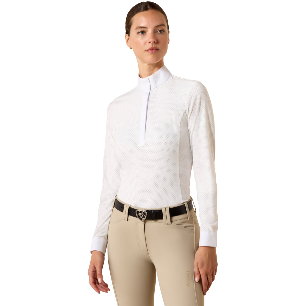 Woman wearing the Ariat Breathe Show Shirt in white with perforated fabric and quarter zip