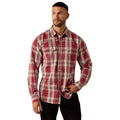 Man wearing a red and beige plaid shirt on a white background