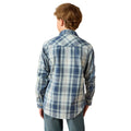 A boy viewed from the back wearing a blue, white, and gray plaid long-sleeve button-up shirt and blue jeans, set against a plain white background.