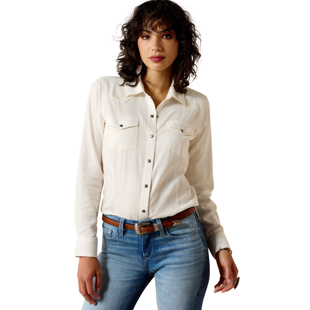 Woman wearing the Bianca Western Snap Shirt in cream with double chest pockets and pearl snaps.