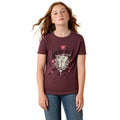 Girl wearing a maroon t-shirt with a graphic design on a white background