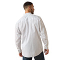 Man wearing a white patterned shirt on a white background