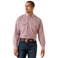 Man wearing a red patterned shirt and blue jeans on a white background