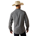 Man wearing a checkered shirt and cowboy hat on a white background