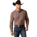 Man wearing a brown checkered shirt, blue jeans, and a brown cowboy hat on a white background