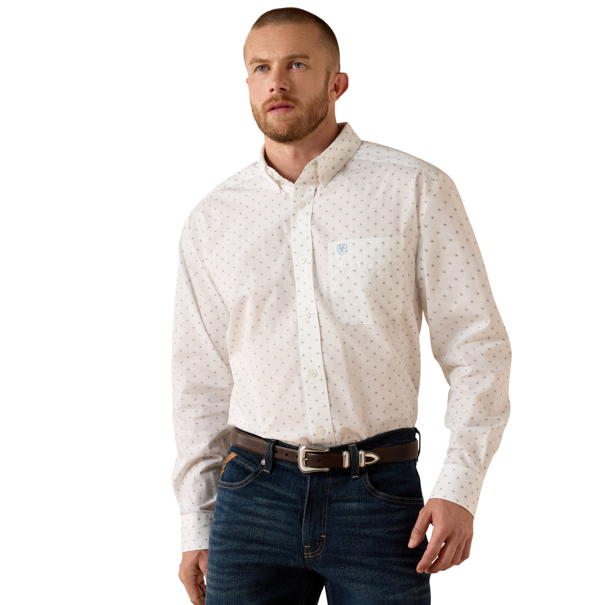 Ariat wrinkle-free shirt in cream with a subtle print, styled with jeans and a leather belt