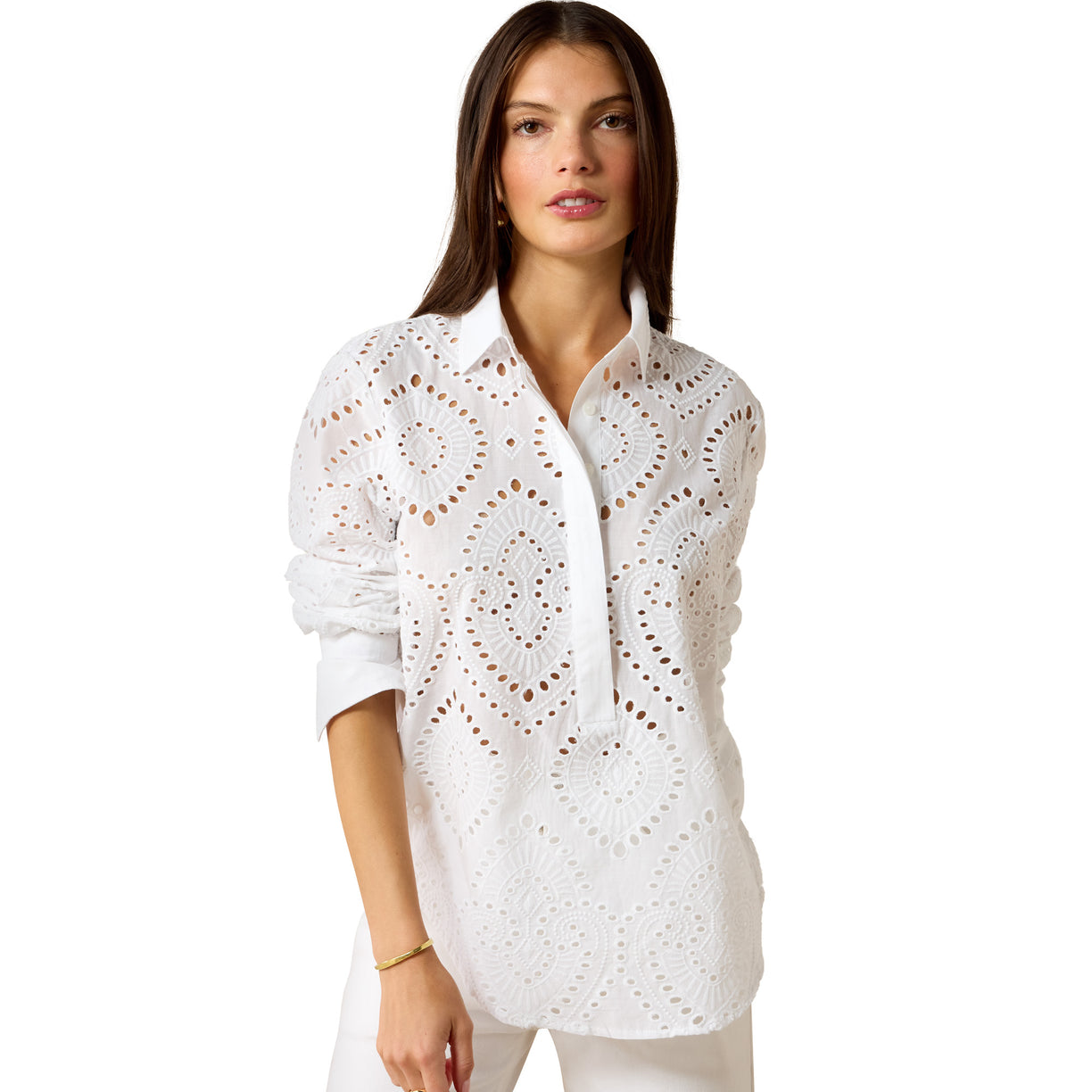 Woman wearing a white lace blouse on a white background