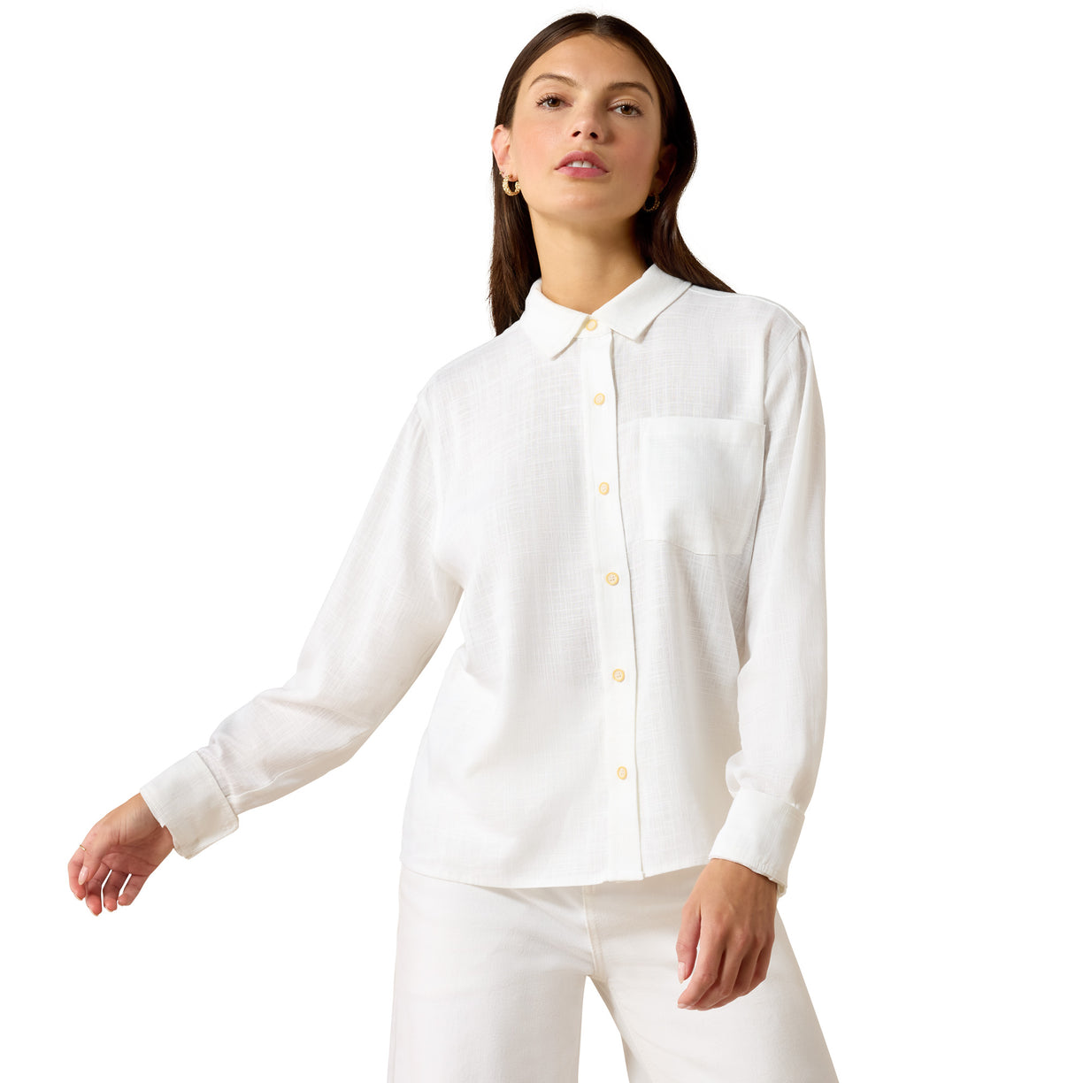 Woman wearing a white button-up shirt on a white background