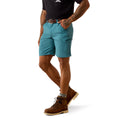 Ariat Rebar WorkFlow Ultralight 9 inch DuraStretch Shorts in teal, cargo pocket detail, waist-down front view with boots