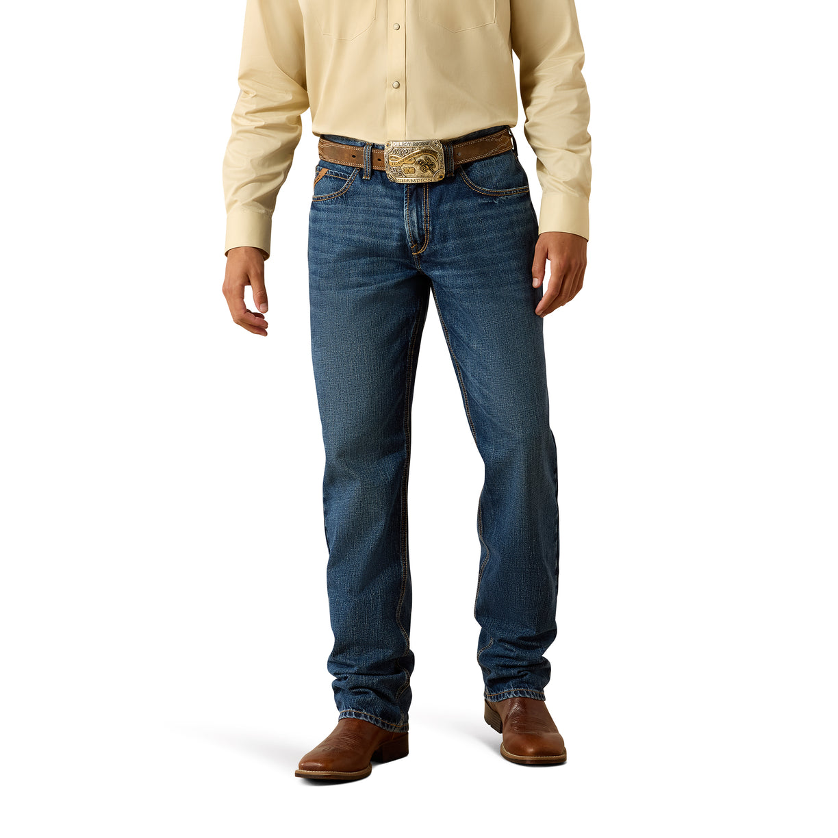 Person wearing blue jeans, a beige shirt, and brown shoes on a white background