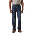 Person wearing blue jeans on a white background