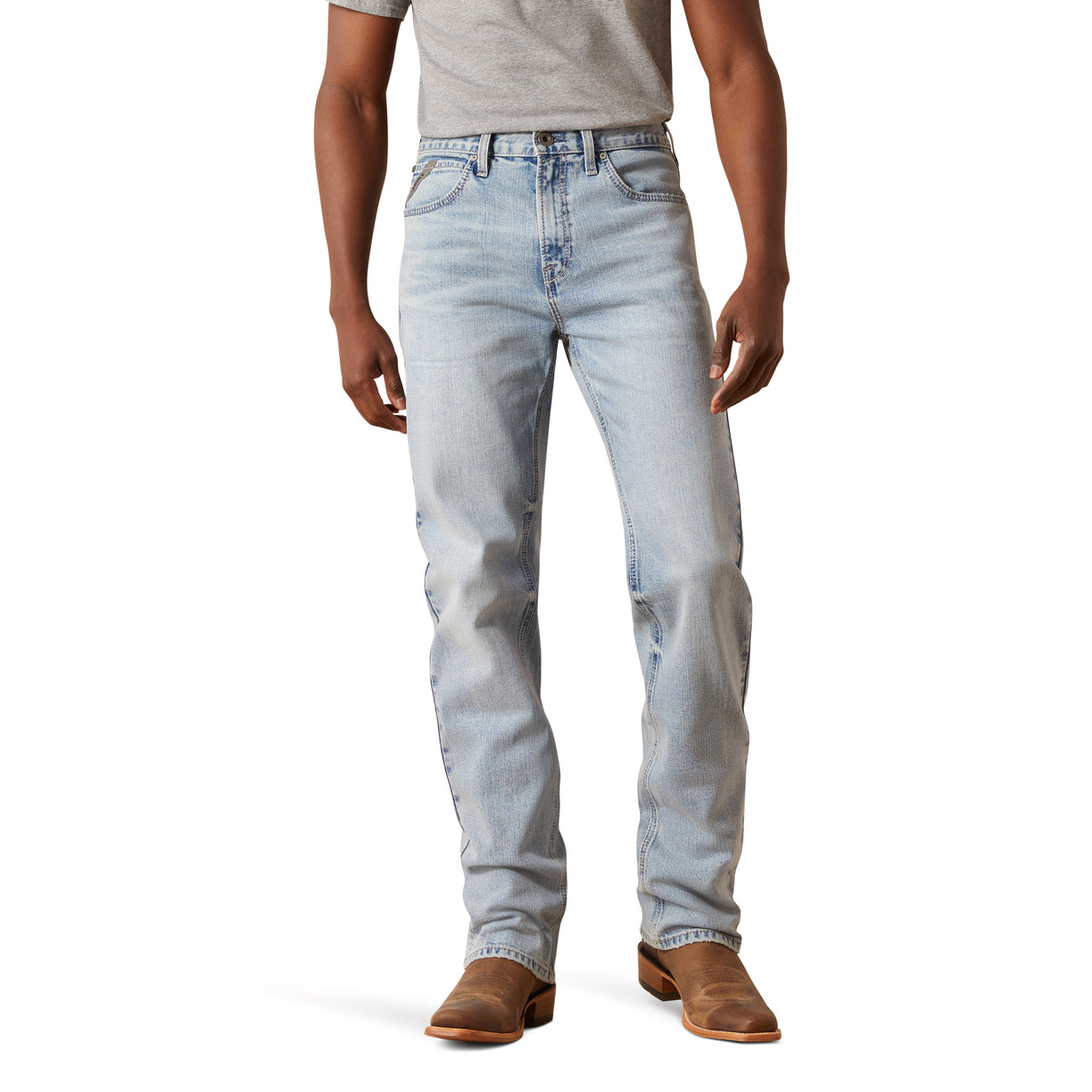 Light blue jeans worn by a person on a white background