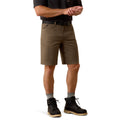 Man wearing the Ariat Rebar DuraStretch Made Tough 10 inch Short in olive