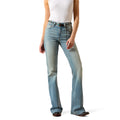 Person wearing light blue jeans on a white background