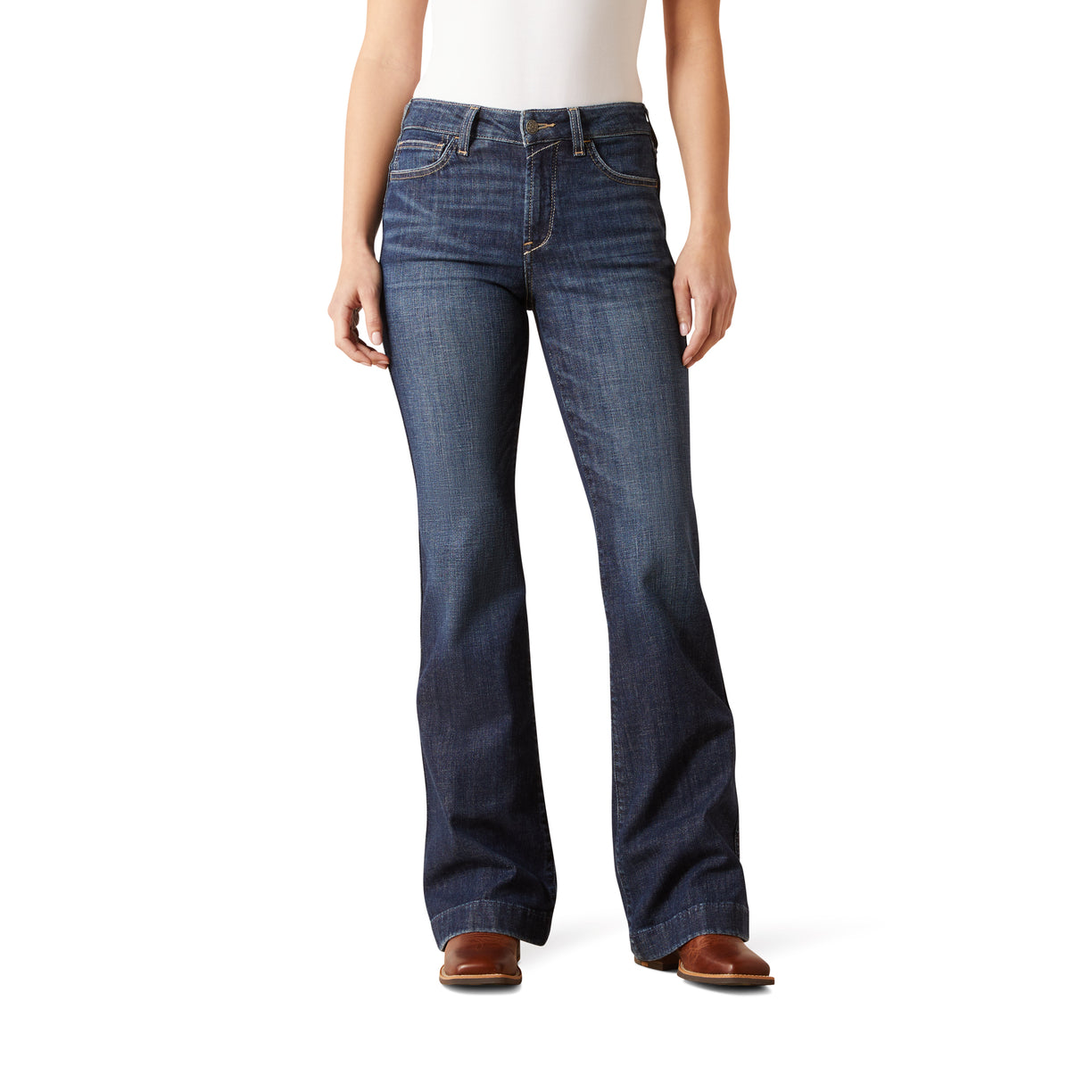 Person wearing blue jeans on a white background