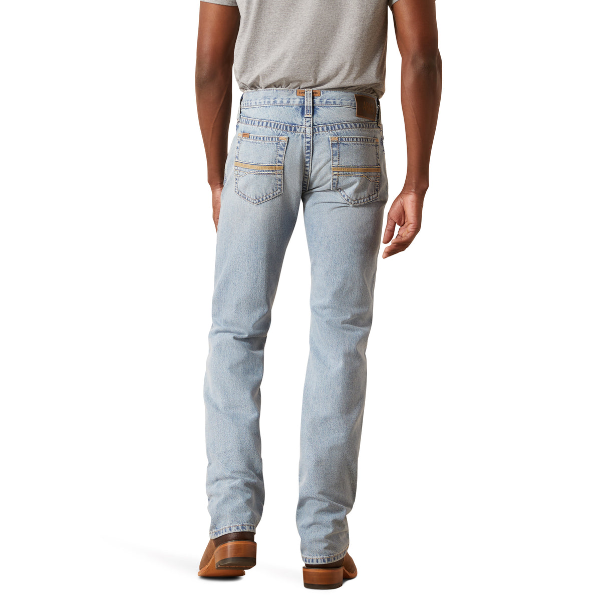 Light blue jeans worn by a person on a white background