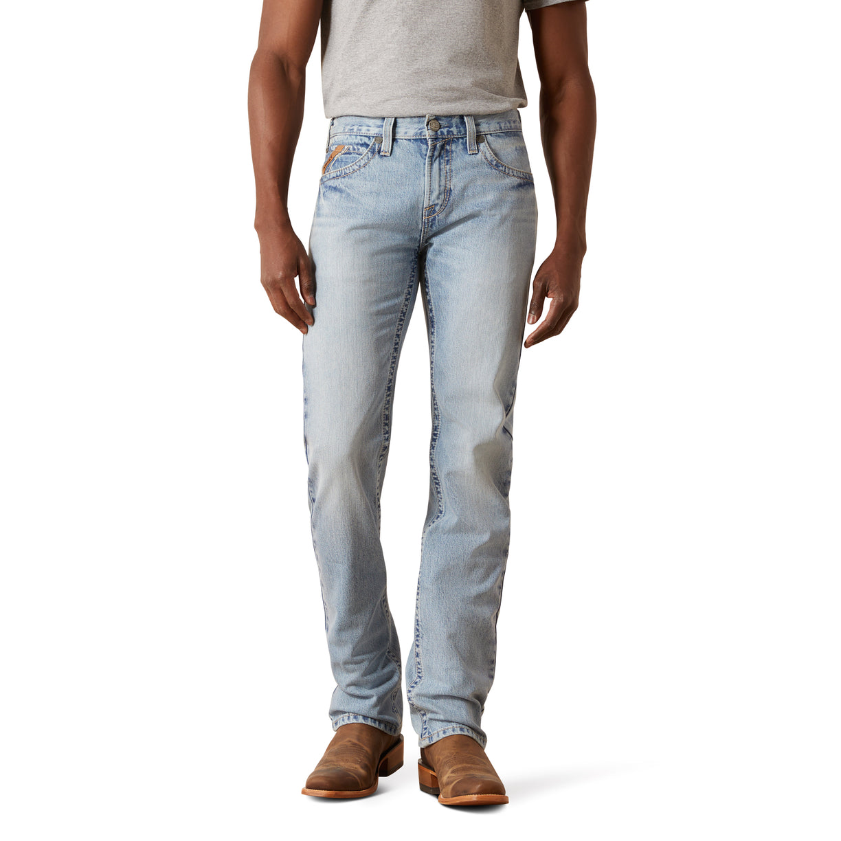 Light blue jeans worn by a person on a white background