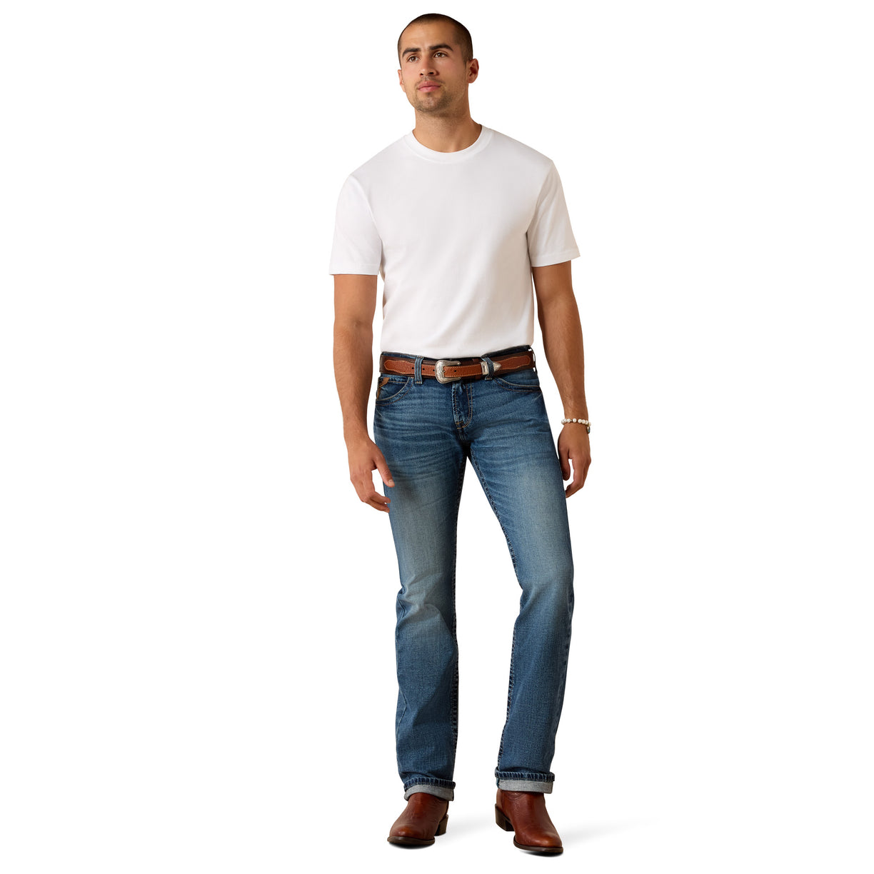 Man wearing a white t-shirt and blue jeans on a white background