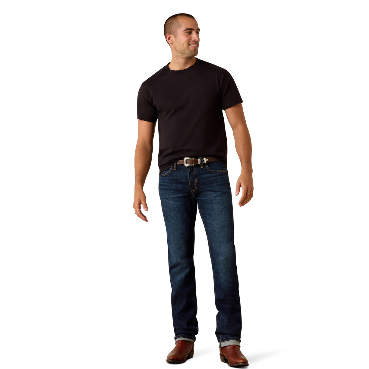 Man wearing a black t-shirt and blue jeans on a white background