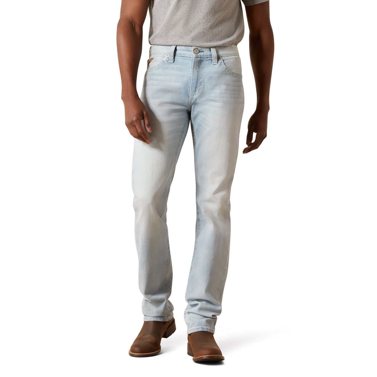 Light blue jeans worn by a person on a white background