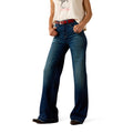 Person wearing blue jeans on a white background