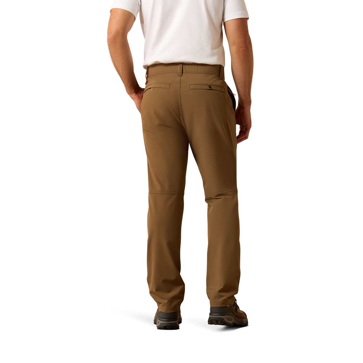 Brown pants worn by a person on a white background