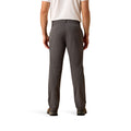 Person wearing gray pants on a white background