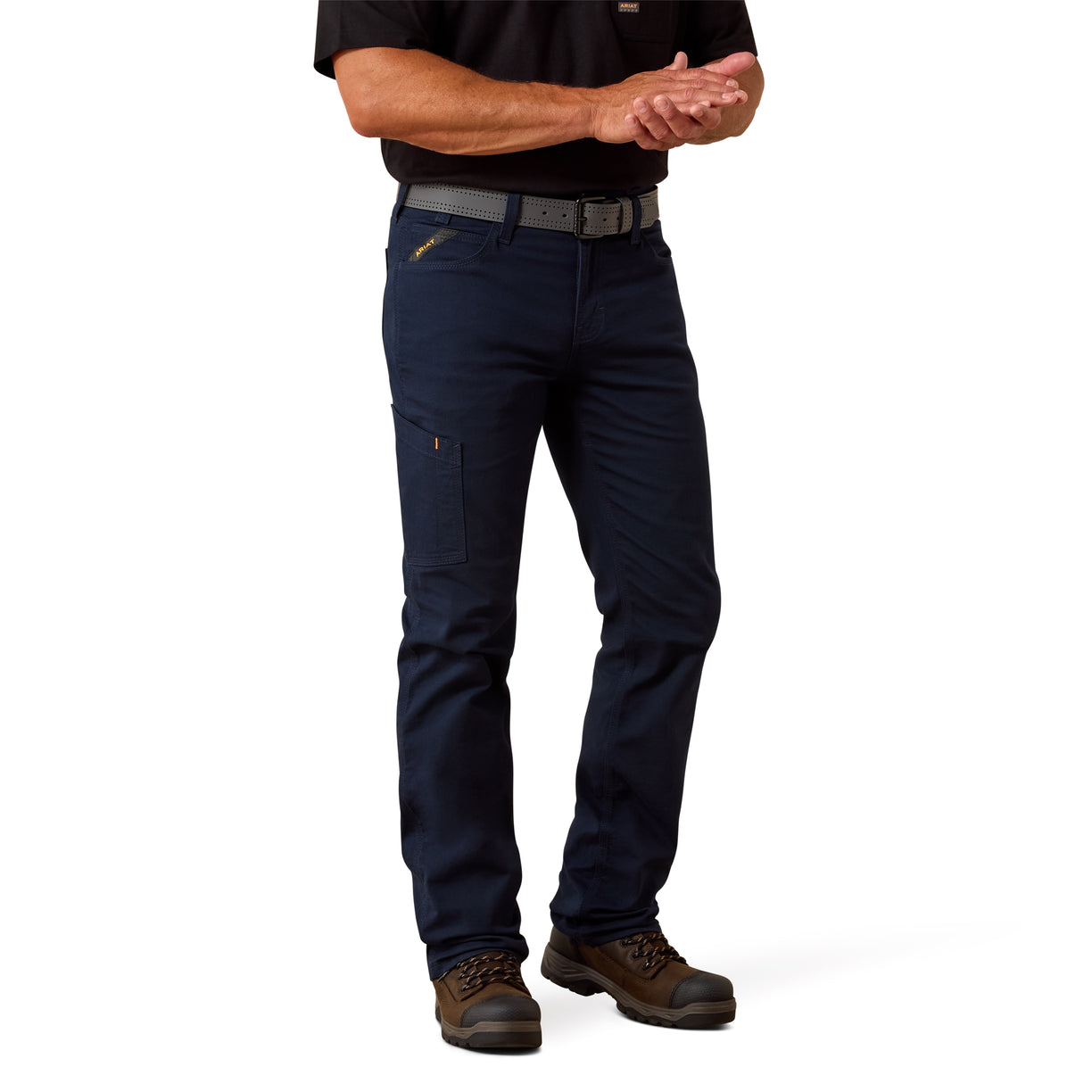 Slim straight-leg fit through the hip and thigh - Ariat Rebar M7 DuraStretch Made Tough Straight Pant in navy, worn with boots