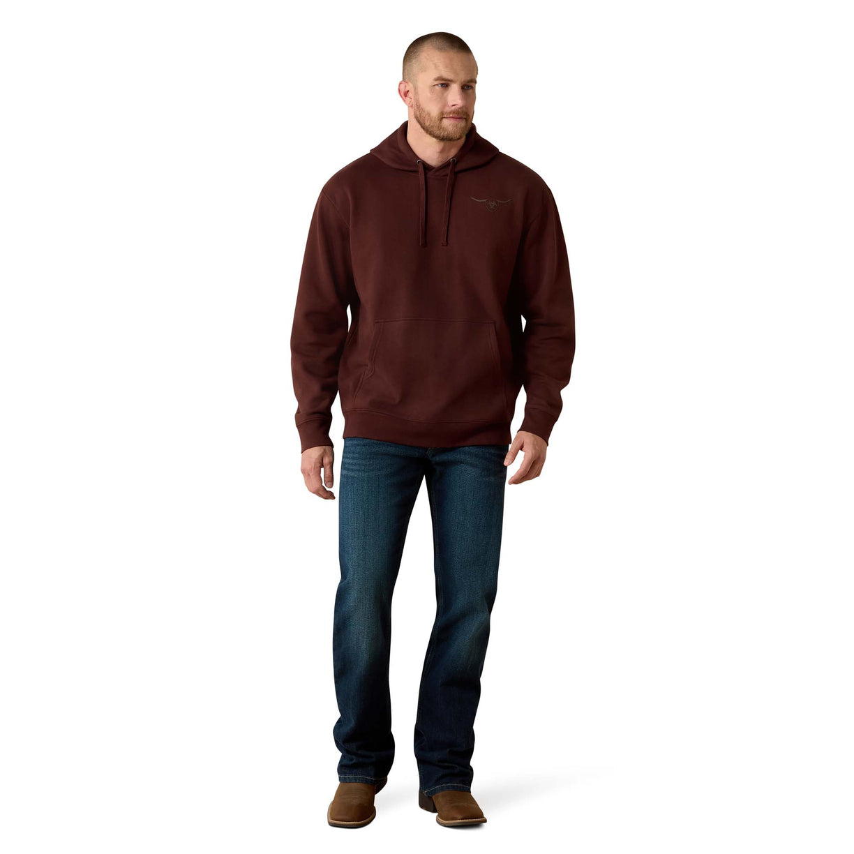 Man wearing a brown hoodie and blue jeans on a white background