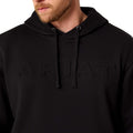 Black hoodie with a brand logo on a white background