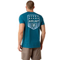 Man wearing a blue Ariat t-shirt with a logo on the back against a white background
