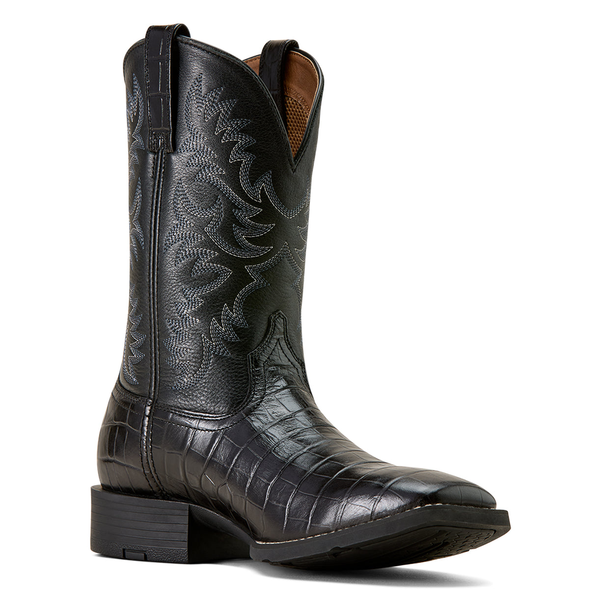 Black cowboy boot with detailed pattern on a white background