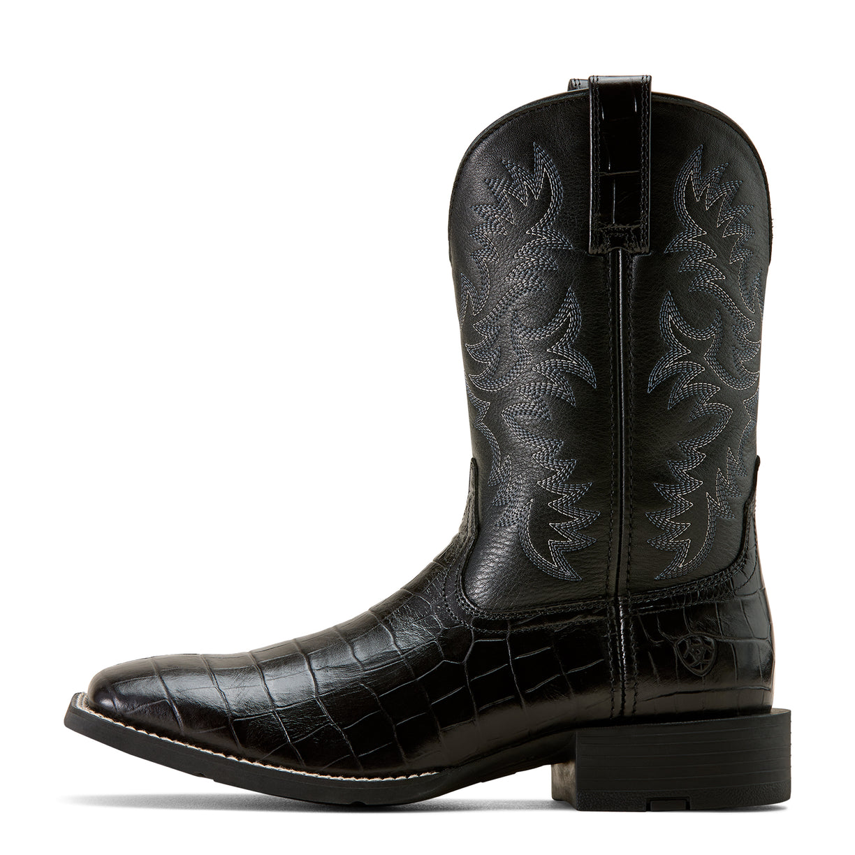 Black cowboy boot with embossed design on a white background