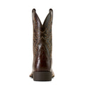 Brown cowboy boot with intricate design on a white background