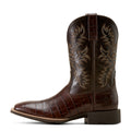 Brown cowboy boot with intricate design on a white background