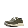 Green casual shoe with white laces on a white background
