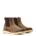 Pair of brown leather boots with a white background