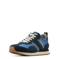 Blue and navy sneaker with white laces on a white background