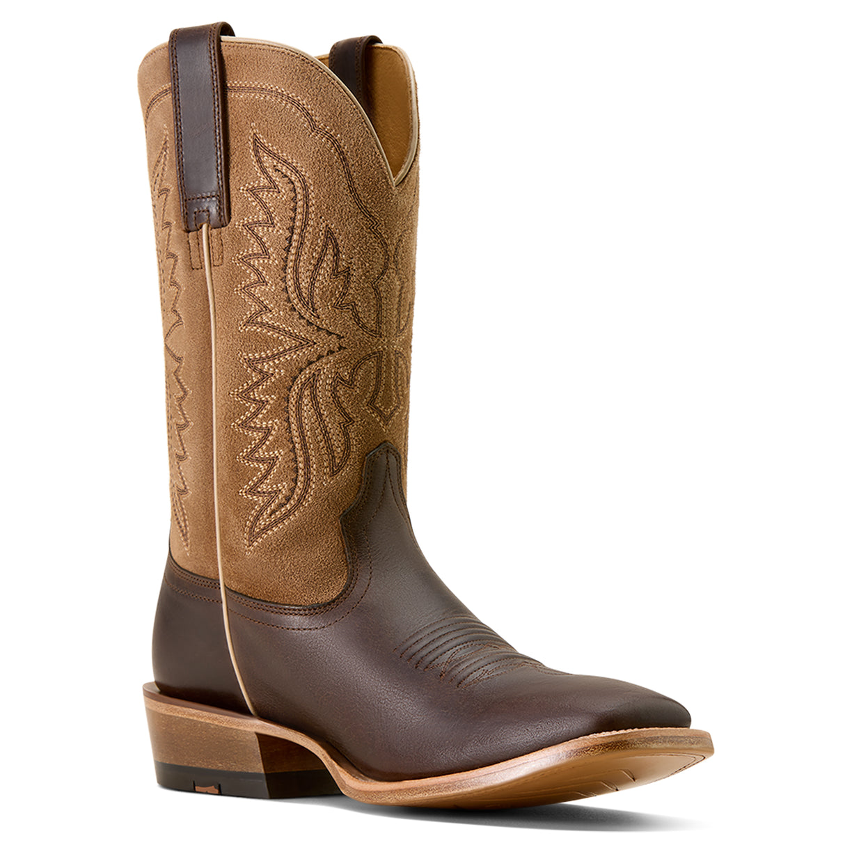 Brown cowboy boot with intricate design on a white background