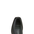 Close-up of a black leather boot sole on a white background
